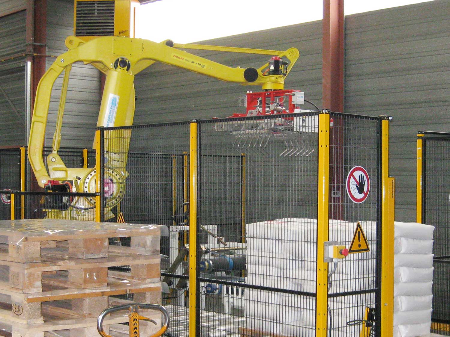 Installation photo of Satech BASIC, the OSHA-Approved Machine, protecting robots