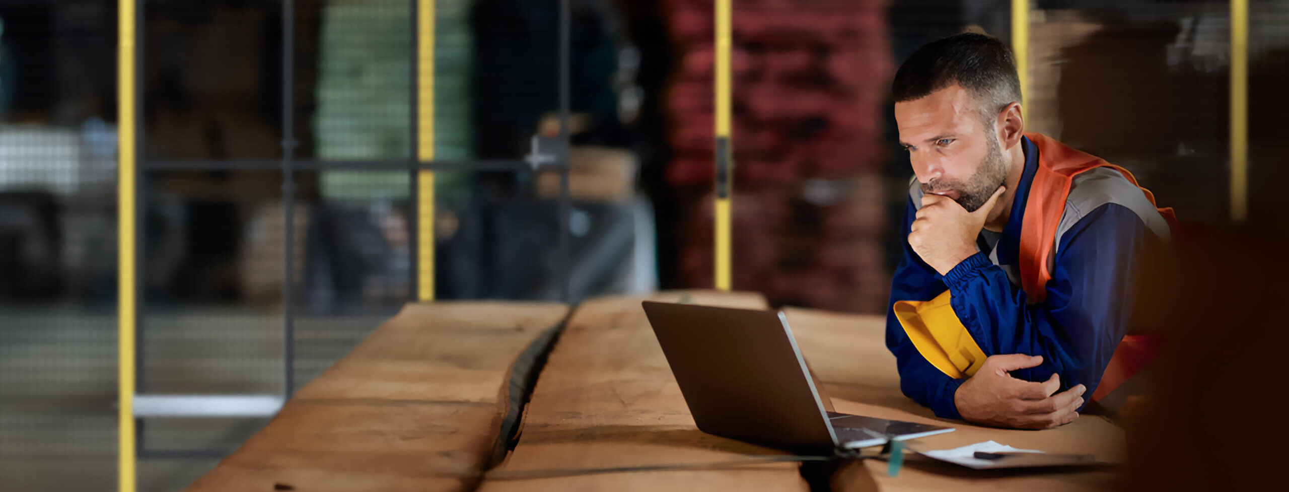 Photo of an operator choosing between Revamping existing machinery or purchasing new machinery.