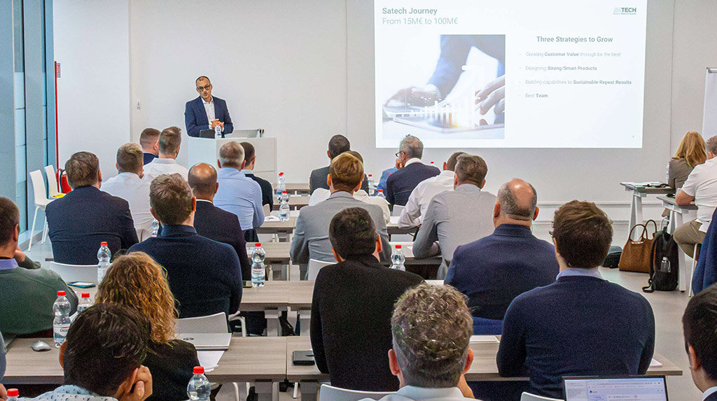 Panoramic photo of the 2024 Satech Sales Conference, featuring CEO Xavier Garcia presenting his speech